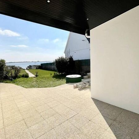 Maison de charme vue mer 180 rénovée Accès plage Riantec Exterior foto